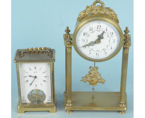 A vintage brass and enamel mantel clock, 25cm tall (slight damage to face 4/5 o'clock position) plus a 'Schatz' 8 day carriag