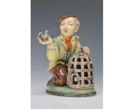 Skulptur, Karlsruher Majolika, 1938-1940,  Der Vogelhändler, Entwurf Max Heinze, bunt bemalt, H. ca. 29cm, Modellnr. 4903Scul