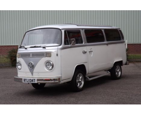Nine-seat day bus used as part of a wedding hire fleet. This particular example is finished in white with a silver top, flash