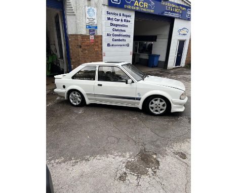 Desirable 'Performance Ford' rebuild project waiting to be started. In Diamond White with the classic RS Turbo look featuring