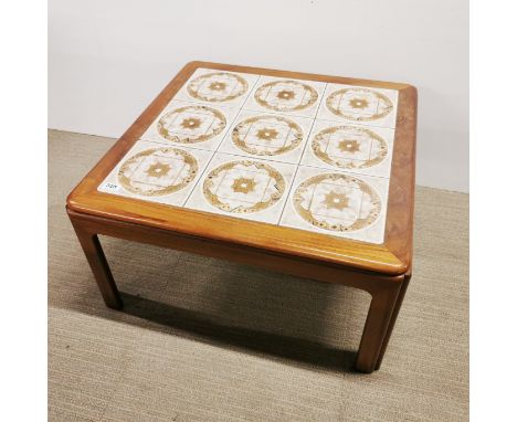 A 1970's tile topped teak coffee table, 72 x 72 x 38cm.