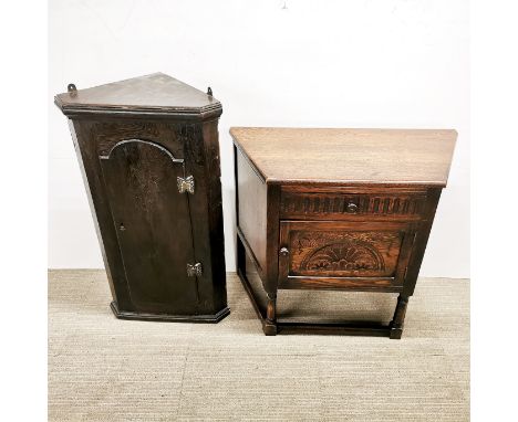 A carved oak single drawer side/console table, 86 x 74 x 40cm. together with an oak two shelf corner wall cabinet.