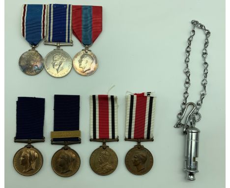 A GROUP OF SEVEN POLICE-RELATED MEDALS INCLUDING AN IMPERIAL SERVICE MEDAL – QUEEN VICTORIA, KING GEORGE V, & KING GEORGE  VI