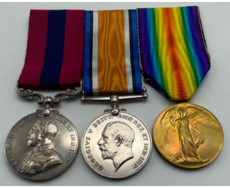 WWI GROUP OF THREE MEDALS INCLUDING DISTINGUISHED CONDUCT MEDALBRITISH WAR AND VICTORY MEDAL 4246 SJT. E. NATHAN. MIDD’X R.DI