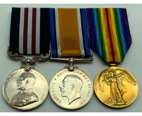 WWI GROUP OF THREE MEDALS INCLUDING MILITARY MEDALBRITISH WAR AND VICTORY MEDAL 27775 PTE. R. THISTLETHWAITE R. LANC.RMILITAR