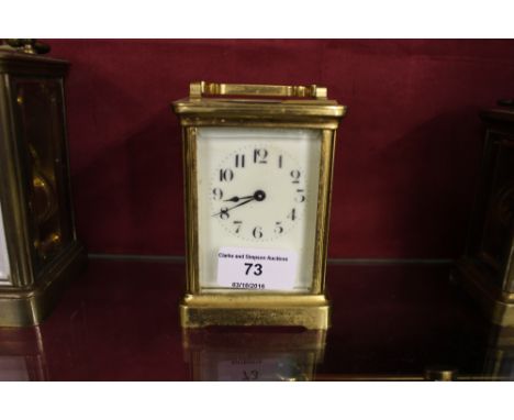 A brass cased carriage clock