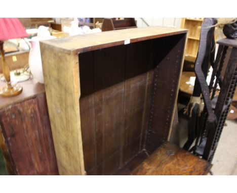 A stripped mahogany and open book shelf