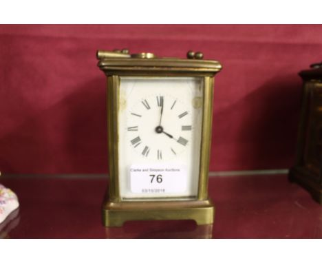 A brass cased carriage clock - with key