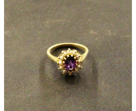 A 9ct gold amethyst and pearl set ring