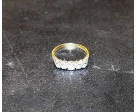 An 18ct gold diamond set ring