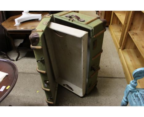 A green canvas, leather and wooden bound cabinet trunk 