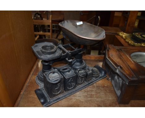 A set of vintage cast iron scales and weights (selling for St Johns Hospice, Lancaster)