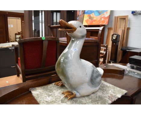 A large ceramic duck figure, height approx. 50cm