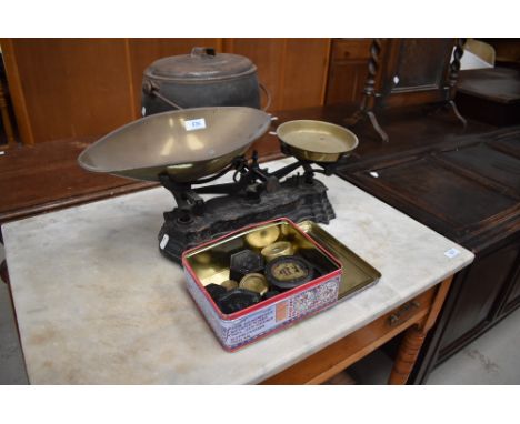 A vintage kitchen scale and selection of weights, including Victorian brass (selling for St Johns Hospice, Lancaster)
