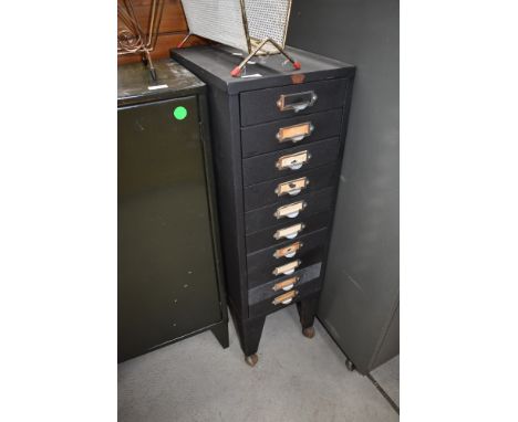A vintage filing drawer set with additional shepherds casters
drawers are 6.4cm deep