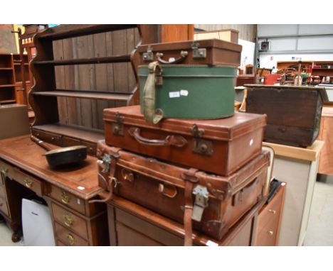 A selection of vintage travel cases including leather