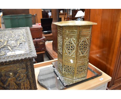 An Eastern brass octagonal table and two vintage mirrors