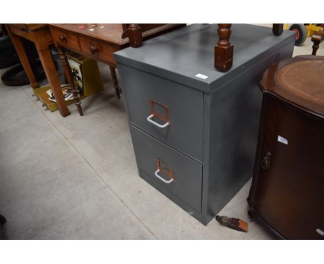 A vintage two drawer filing cabinet