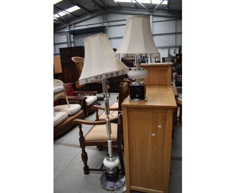 Two art deco styled mid century lamps in chrome and enamel