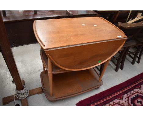 An Ercol light/mid colour tea trolley