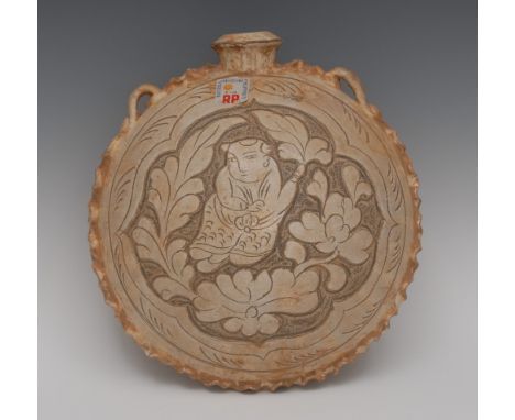 A Chinese earthernware flask, of saddle form, in relief with a boy within leafy branches, crimped border, applied with slight