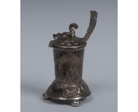 A Norwegian silver tankard shaped mustard, sea dragon finial, skirted base chased with leafy scrolls, bun feet, 9cm high, spo