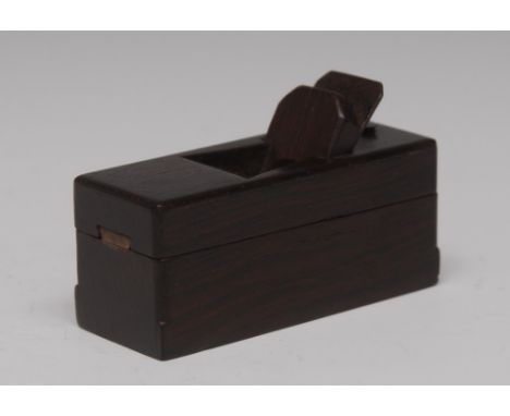 An unusual 19th century rosewood novelty snuff box, as a carpenter's wood plane, slide pivoting cover enclosing a dished rese