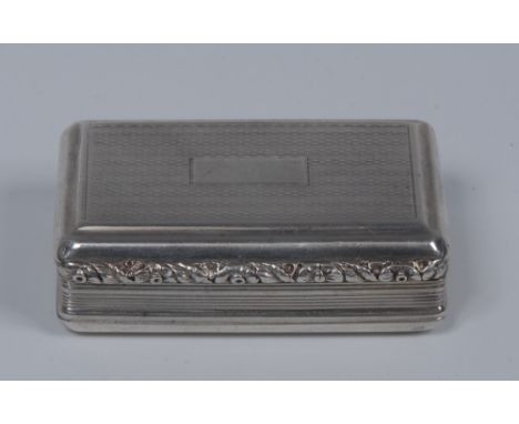 A George III rounded rectangular silver snuff box, fielded and engine turned hinged cover enclosing a gilt interior, foliate 