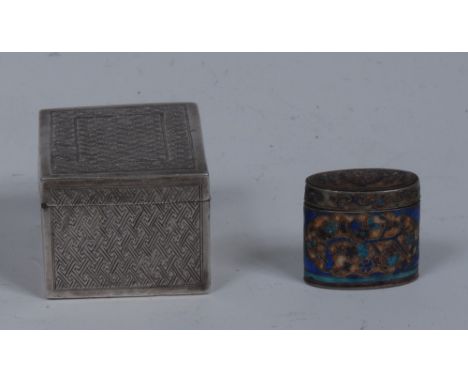 A Chinese silver and enamel oval bonbonniere, brightly decorated with flowers scrolls and symbols, push-fitting cover, 2.5cm 