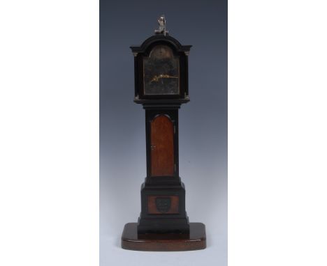 A George III style miniature longcase clock, 7cm arched silvered dial with Roman and subsidiary Arabic numerals, faux Strike/