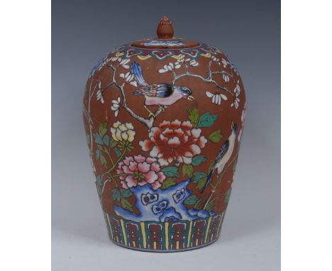 A Chinese Yixing terracotta ovoid ginger jar and cover, decorated in colourful polychrome with Asiatic pheasant and exotic bi