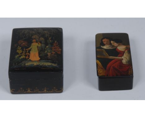 A Victorian rounded rectangular papier-mâché snuff box, the hinged cover painted with a 17th century couple of title examinin