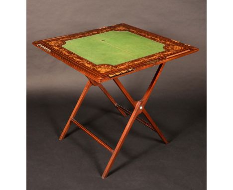 An Edwardian mahogany and marquetry patent closing upright card table, by W. Thornhill & Co, New Bond Street, London, folding