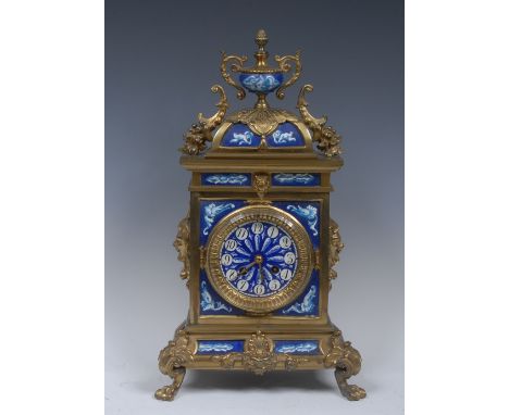 A late 19th century French gilt brass mantel clock, 9.5cm circular dial inscribed with Arabic numerals, twin-winding holes, 1