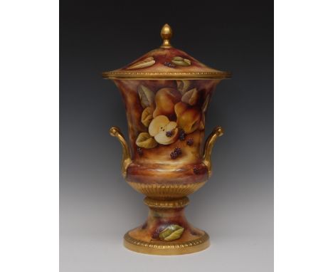 A Caverswall two handled campana shaped urn and cover, decorated with by Micheal Bates, signed with ripe fruit on a mossy ban