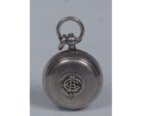 A George V silver circular sovereign case, hinged spring-loaded cover, engine turned, 5cm over loop, Birmingham 1913