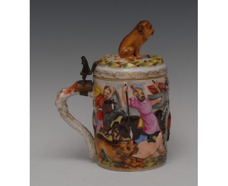 A late 19th century Naples tankard, in relief with warriors in battle with lions, in colours, the hinged cover with lion fini