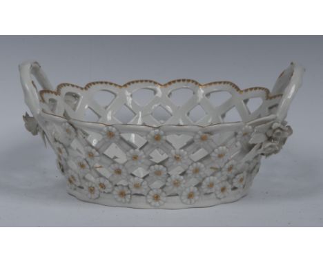 A Worcester pierced oval two-handled basket, applied with flowerheads, rustic handles with flowerheads, gilt dentil borders, 