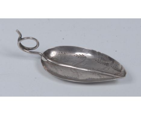 A George III Roman leaf silver tea caddy spoon, the bowl bright-cut engraved with foliage, curled wirework handle, 7cm long, 