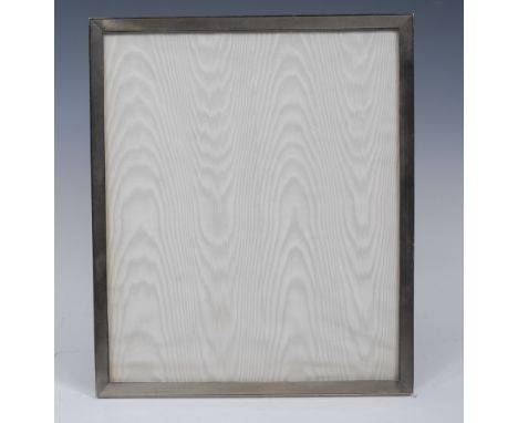 A large Elizabeth II silver rectangular easel photograph frame, engine turned border, 33.5cm high, Goldsmiths & Silversmiths 