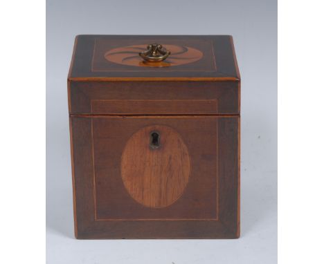 A George III mahogany, rosewood and partridge wood cube tea caddy, the hinged cover inlaid with a wyvern patera and centred b