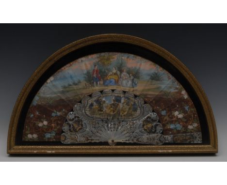 A 19th century French mother-of-pearl and paper fan,  painted with a shepherd, shepherdess and companions, within a pastoral 