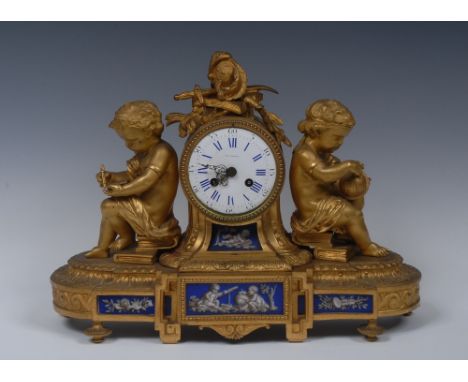 A French Second Empire  ormolu and porcelain mantel clock, 9cm convex enamelled dial inscribed signed Th[eoph]ile Martin,Pari