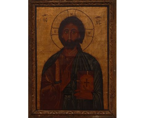 A 19th century Russian Orthodox rectangular icon, depicting Christ Pantocrator, his halo flanked by script and symbols, oil a