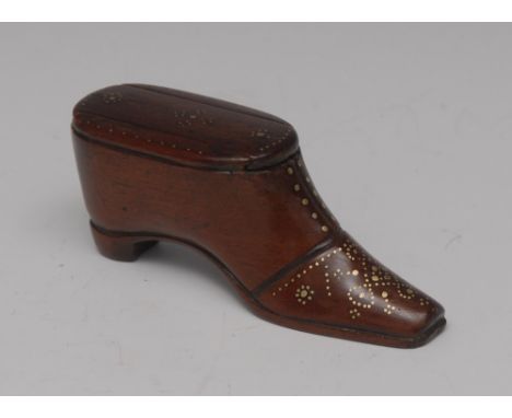 An early 19th century mahogany novelty snuff box, as a shoe, sliding cover, decorated with brass pinwork, 9.5cm long, c.1830
