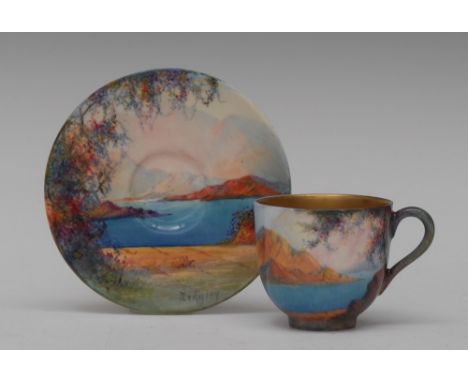 A Royal Worcester cabinet cup and saucer, painted with Sedgley signed, with coastal cove, gilt interior, printed crown and ci