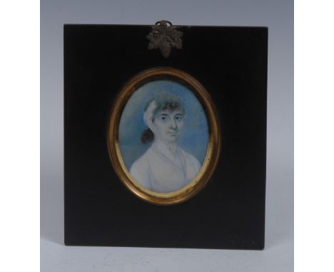 English School (early 19th century), a portrait miniature, of a lady, bust-length, wearing white muslin headdress and dress, 