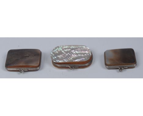An early 20th century rounded rectangular mother-of-pearl lady's purse, the front panel carved and engraved with a fisherman 