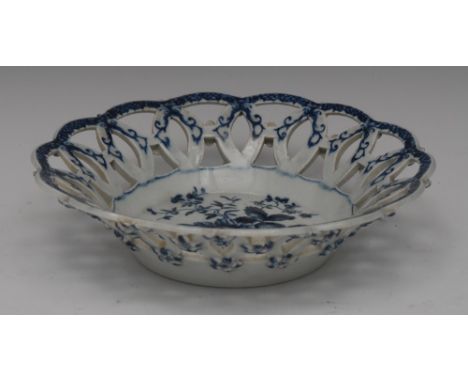 A Worcester Pine Cone pattern shaped circular basket, printed in underglaze blue with two pine cones, peony and pomegranate, 