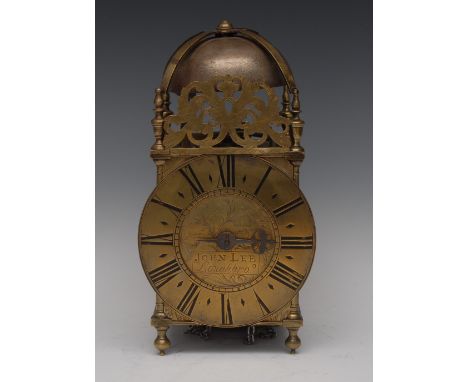 A 17th century style lantern clock, the 16cm circular brass dial with Roman numerals inscribed John Lee, Loughbro', single ir